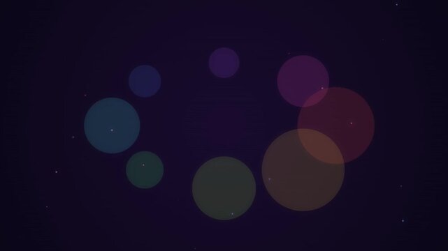 Abstract rotating colorful circles on dark background loading animation.