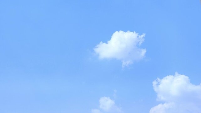 Clear Blue Sky with White Clouds Background