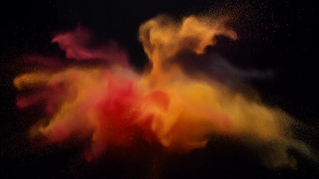 Slow motion static dolly pan of colored powder cloud exploding and dispersing in black studio background