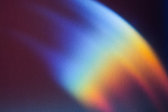 Abstract background showing colorful light prism effect creating gradient texture