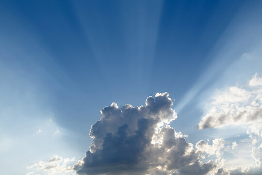Sun rays and clouds
