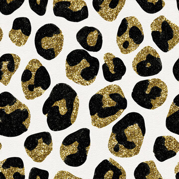Elegant seamless animal print pattern with oversized black and gold glitter spots on white