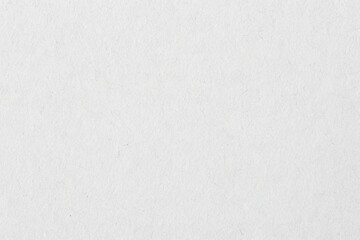 Fototapeta premium White recycled paper texture with rough grain surface, blank cardboard background for stationery, packaging, printing, branding, mockups and creative design.