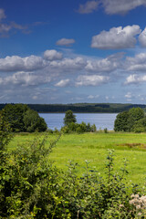 View of Lake Ruczewo Wielkie and the hills beyond it. Iława Lake District, Poland. © Leszek