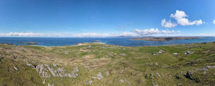 Bay on the Isle of Iona towards the Mull Hills, Iona Abbey on the Right, Inner Hebrides, Scotland - Wide Panorama