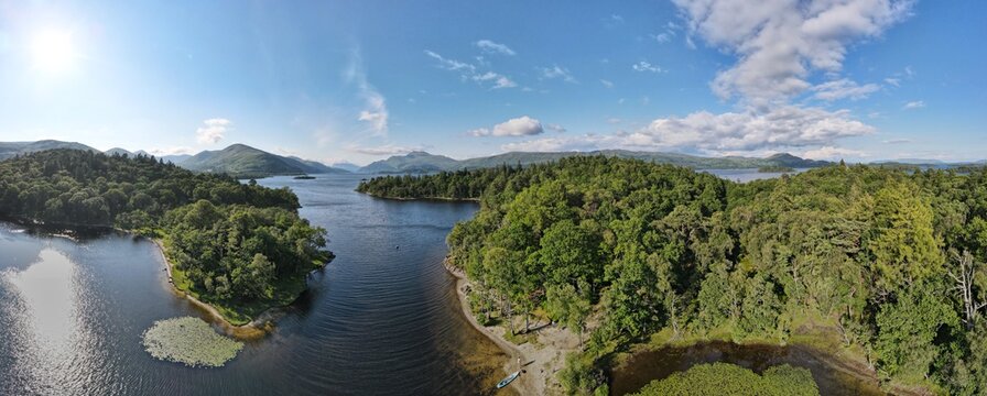 The Narrows between Inchtavannach and Inchconachan (Wallaby Island), Loch Lomond - Paddleboarder, Scotland - Wide Panorama