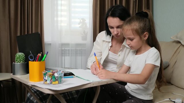 Busy Working Mom Studying Online with Child at Home Office