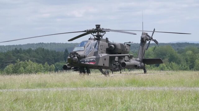 Combat Helicopters Flying Under Cloudy Sky