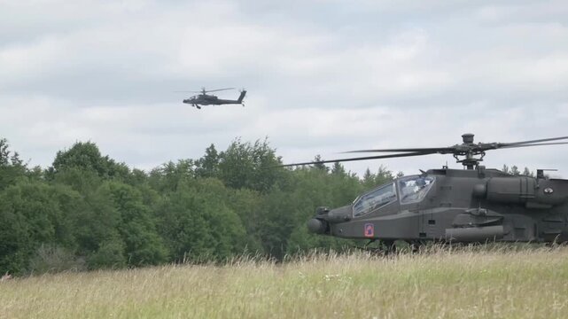 Apache Attack Helicopters Conducting Military Exercise