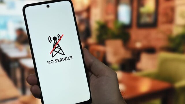 Communication issues concept with a smartphone displaying a no service error message