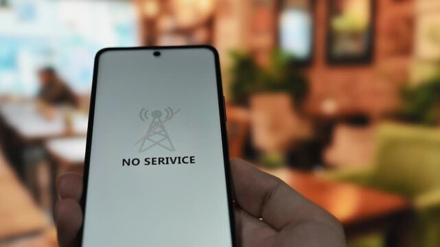 Communication issues concept with a smartphone displaying a no service error message
