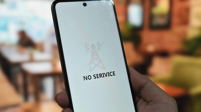 Communication issues concept with a smartphone displaying a no service error message