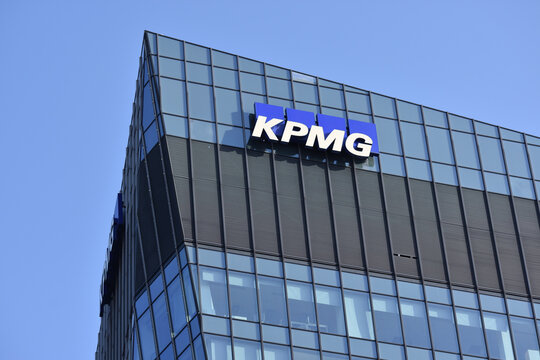 KPMG (Klynveld Peat Marwick Goerdeler) company logo, emblem, signage on the facade. Audit, tax and advisory services. WARSAW, POLAND - APRIL 25, 2026