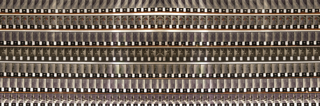strips of vintage 8mm and 16mm movie film aligned horizontally