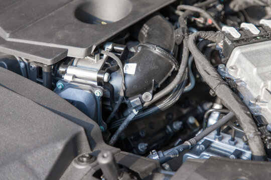 Close up detail of the engine of a modern car, selective focus