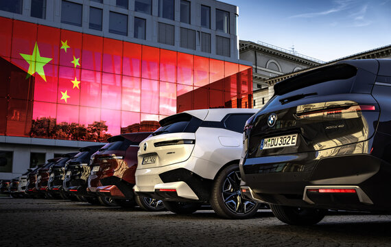 German Cars for China - BMW cars in front of a Chinese flag