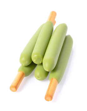 Matcha Coated Cookie Sticks Isolated on White Background
