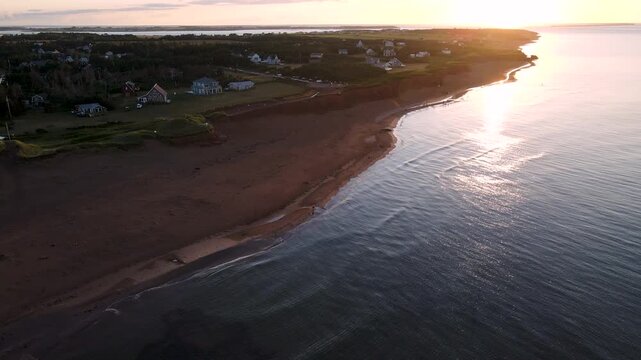 Aerial view of ocean waves and sun glint on the Gulf of St. Lawrence coast, Canada