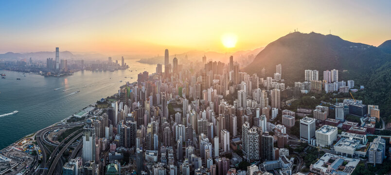 Aerial view of Hong Kong at sunrise morning golden hour
