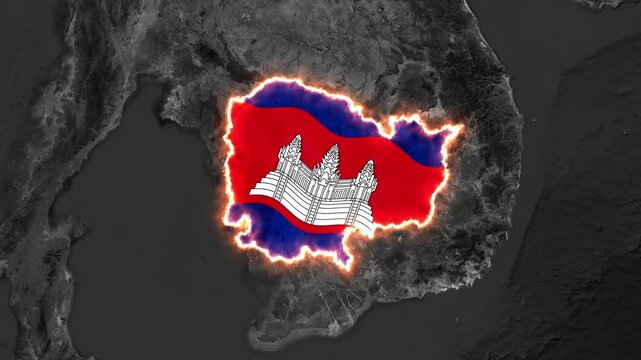 The national flag of Cambodia fills its glowing borders on a dark topographical map of Southeast Asia