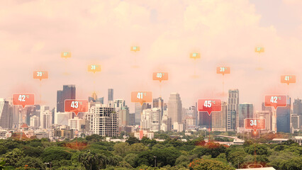 Obraz premium Modern city skyline experiencing an intense extreme heat wave and global warming with high temperature data location icons hovering over modern skyscrapers during hot summer climate crisis