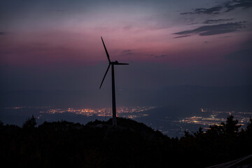 wind turbine at sunset © Murao