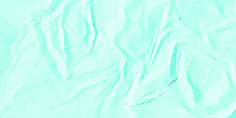 Obraz premium Light Mint Green Crumpled Paper Texture Background for Minimalist Graphic Design