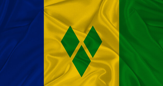 Vincentian flag with fabric texture. Realistic flag of Saint Vincent and the Grenadines waving, National flag