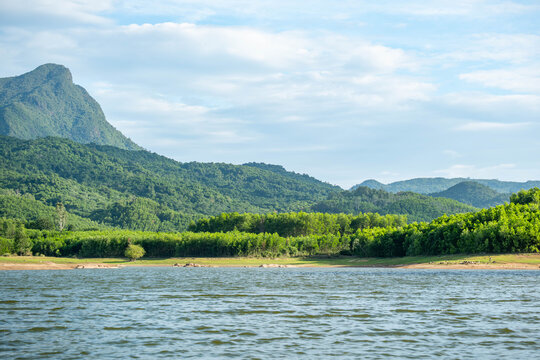 Wide Lake Shore and Rolling Green Mountains