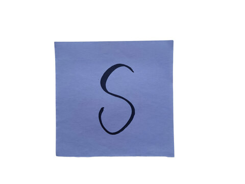 A single, hand-drawn black letter 's' is centered on a square piece of light blue paper, isolated against a stark
