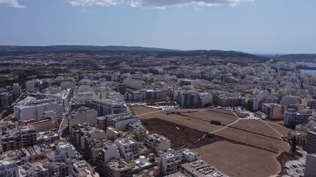 Qawra, Malta 25.07.2026 - Aerial view of Qawra and Qawra Primary School during the summer Archival.