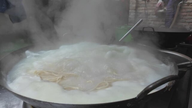 Traditional Yigen Mian One-Root Noodles Being Hand Pulled in Weishan, Yunnan, China, Local Food Culture