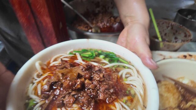 Traditional Yigen Mian One-Root Noodles Being Hand Pulled in Weishan, Yunnan, China, Local Food Culture