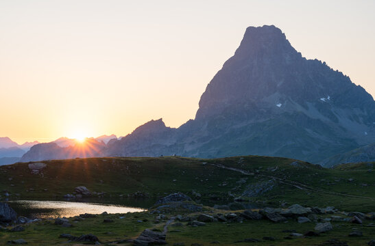 View on the famous Petit Pic du Midi d'Ossau, in the French Pyrenees, during a summer sunrise.