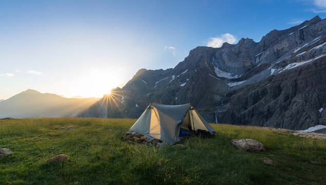 Bivouac in Cirque de Gavarnie, with a few at the Gavarnie Falls, during sunrise.