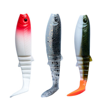 Fishing lure soft silicon bait assortment, set of three swimbaits in red head, dark glitter, and orange tail finishes for predator spinning.