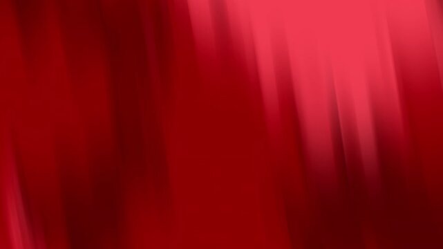 Abstract crimson light streaks in vibrant, glowing, blurred texture with a deep bright ruby shade. Suitable for backgrounds or artistic designs.