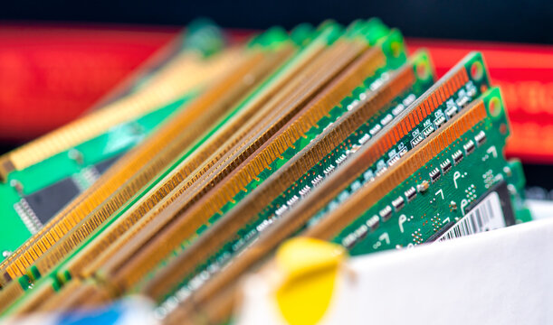 Multiple DDR RAM sticks arranged in organized container ready for computer installation service