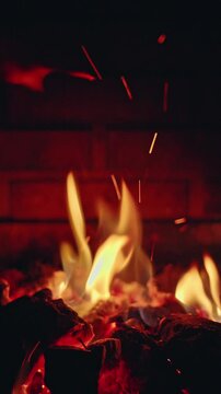 Flying Sparks Above Burning Barbecue Charcoal