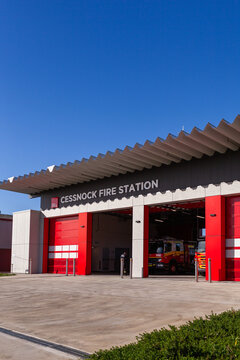 Cessnock Fire Station building in bright sunlight with bay doors open Fire and Rescue NSW
