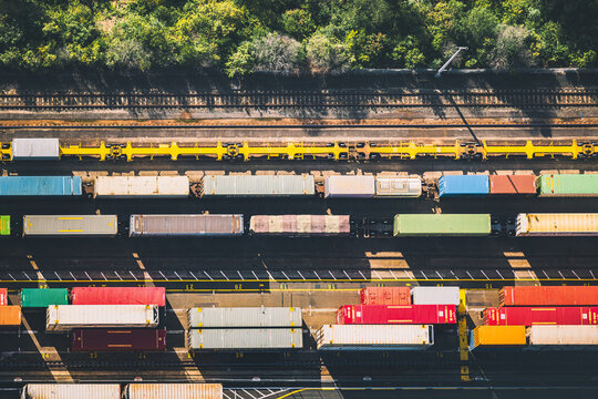 Overhead shot of a colourful carriages in a freight train yard