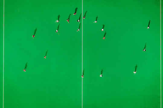 A hockey game on the green court at Kyeemagh.
