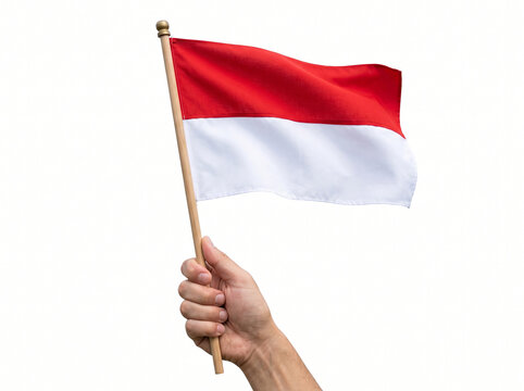 Hand holding Indonesian flag isolated on white background. Independence day concept