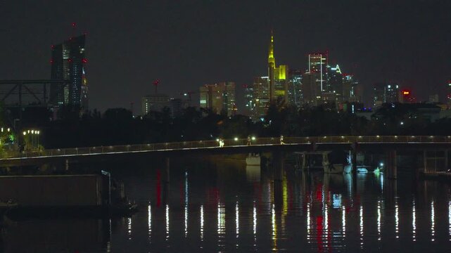 June 25, 2026, Germany, Offenbach am Main, Hesse. beautiful landscape - frankfurt am main in the summer, at night, photographed from the Offenbach Harbor