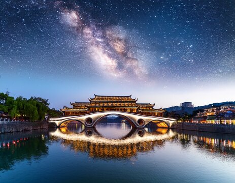 artictic view of anshun bridge on jin river at night with milky way on the sky in chengdu sichuan china