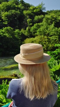 Woman Admiring Blue Eye Spring in Albania