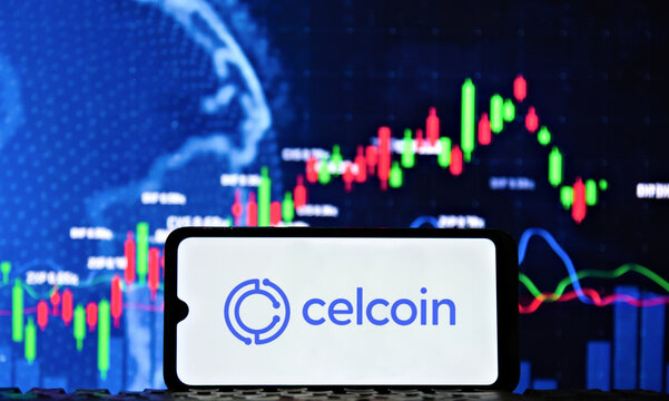 Celcoin FinTech logo on a smartphone screen against a financial stock market chart background. It provides technology infrastructure for banks, fintechs, and companies across various sectors.