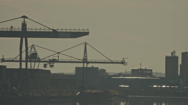 Industrial bridge and transport infrastructure crossing Rhine river in Karlsruhe