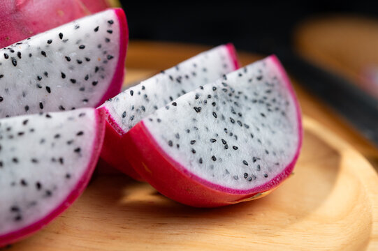 Fresh Dragon Fruit on Wooden Plate