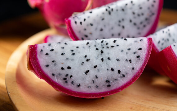 Fresh Dragon Fruit on Wooden Plate